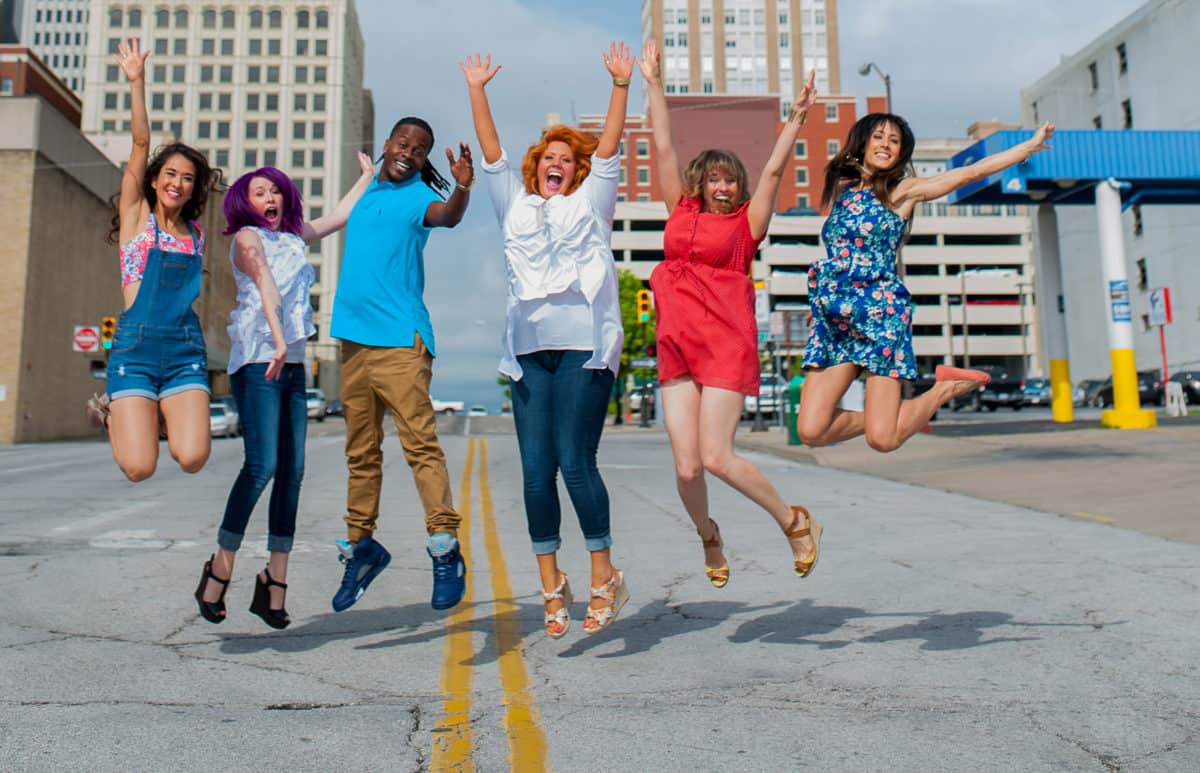 clary sage college students jumping in downtown tulsa ok