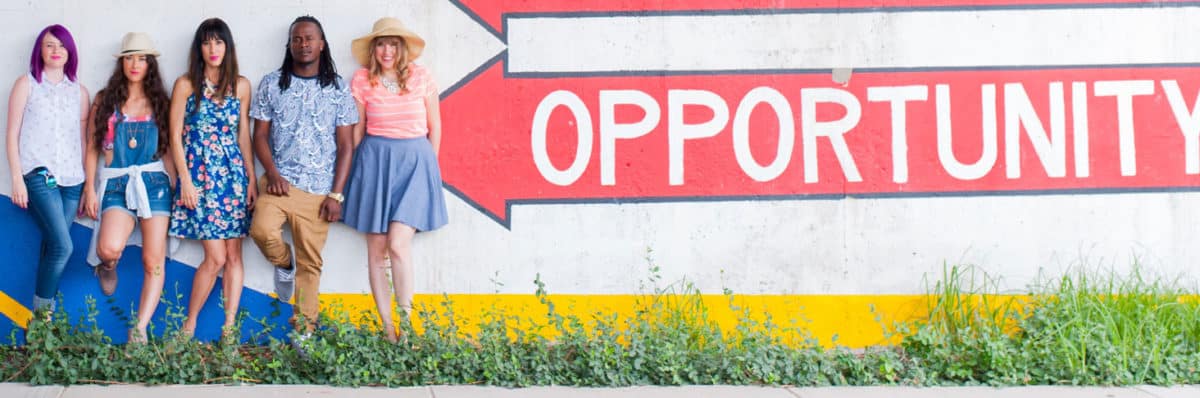 students stand in front of a career opportunity sign in tulsa ok