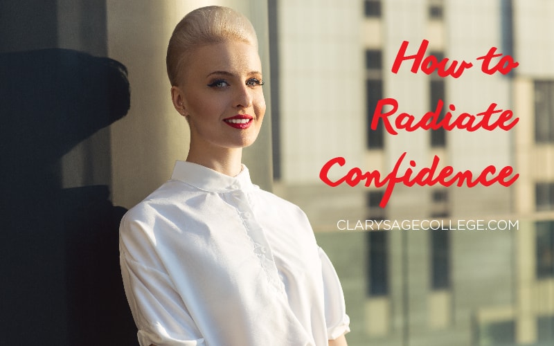 A blond haired woman is posing