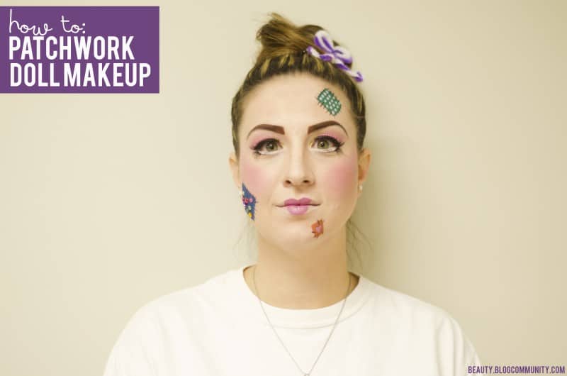 An adult woman with doll makeup on