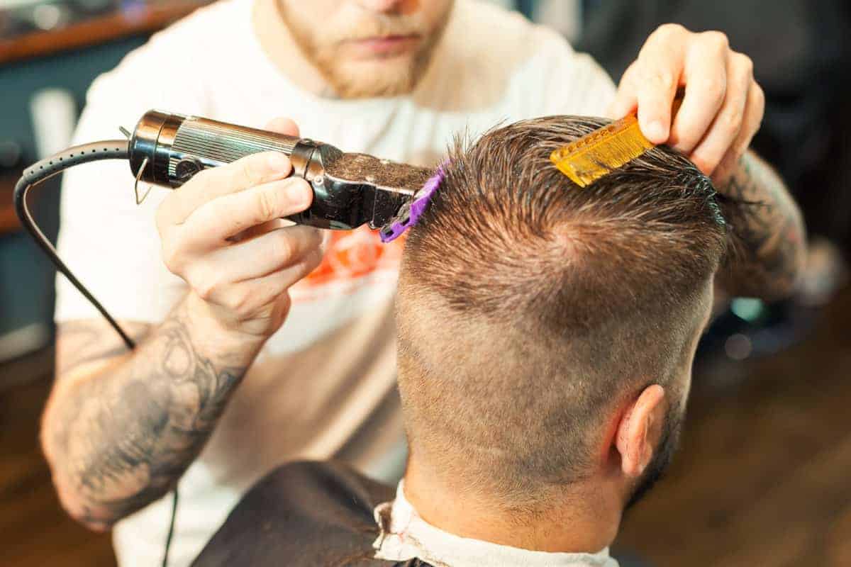 Young Man Shaving Hair at Clary Sage